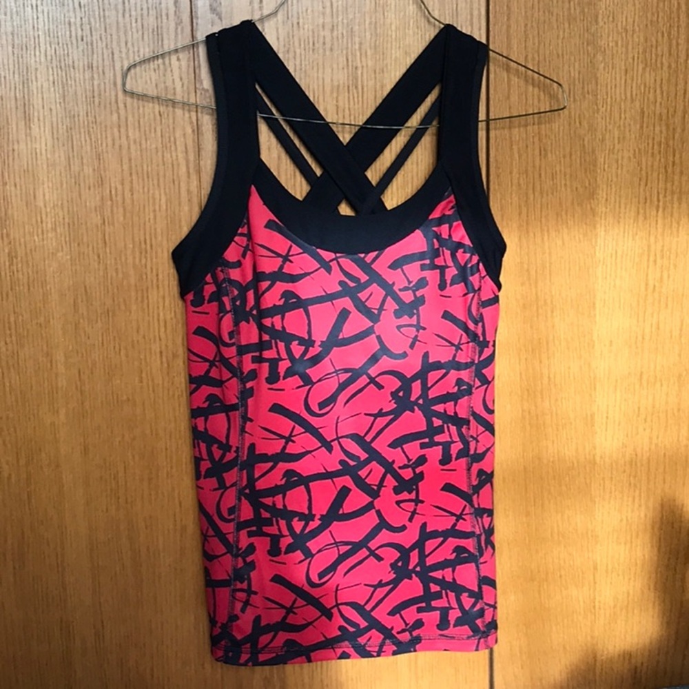 Red and black tank top with built in bra. Size medium.